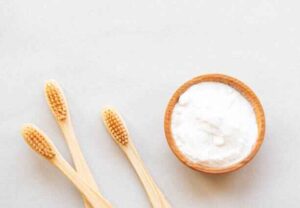 How to safely mix baking soda paste to whiten yellow teeth at home without enamel damage