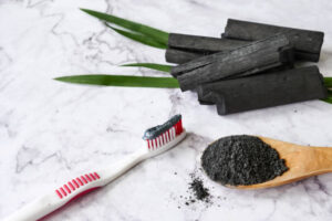 whiten teeth naturally with activated charcoal