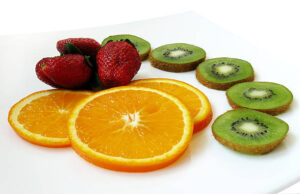 Superfoods for healthy teeth and gums include strawberries, oranges and kiwis