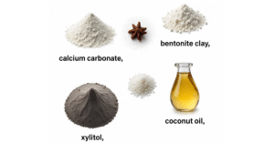 Natural ingredients for a remineralizing toothpaste recipe: calcium carbonate, bentonite clay, xylitol, coconut oil, clove oil