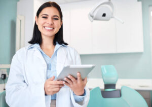 Dental professional reviewing natural plaque removal protocol based on clinical experience